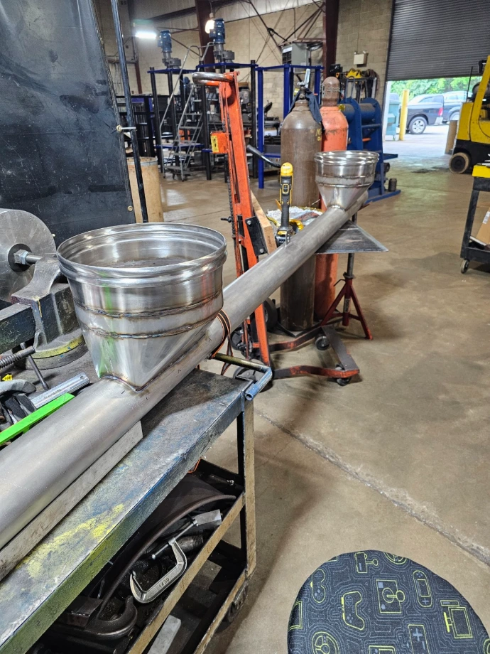 Custom industrial equipment with metal piping and fabricated assemblies