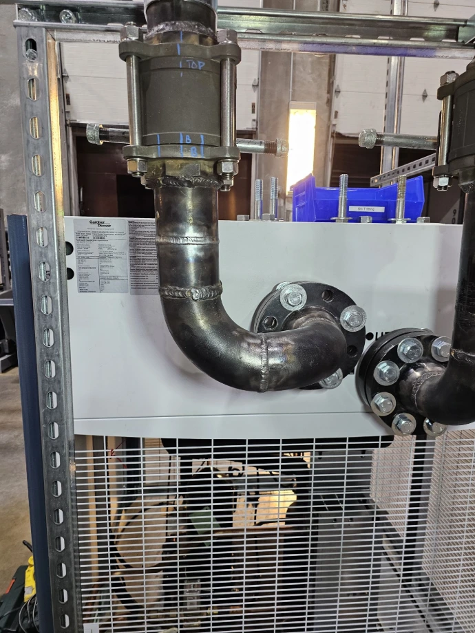 Completed compressor piping modifications with TIG-welded joints