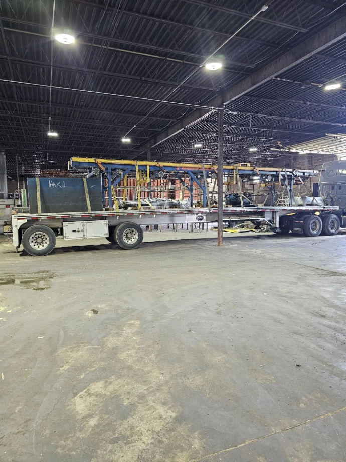 Removed industrial machinery loaded on a trailer for transport